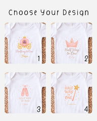 four different white t-shirts with various designs and text, including a princess-themed design, a half-way to one design, and a half-way to one design with a princess crown.