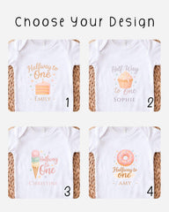 four different t-shirt designs featuring a "Halfway to One" theme, with each design featuring a different dessert or food item.