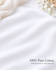 Close-up of white cotton baby grow with text reading '100% Pure Cotton- Soft & gentle on delicate skin.