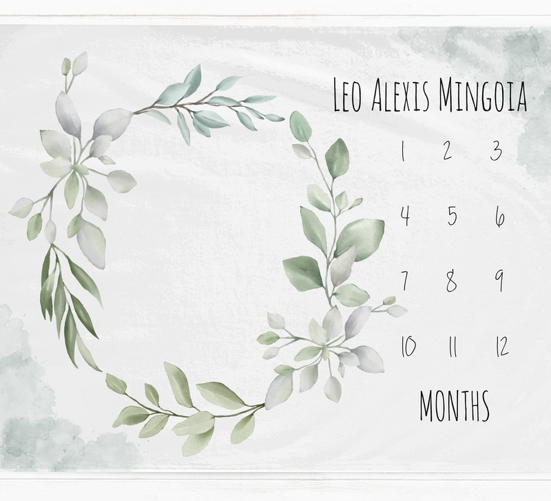 a calendar with a wreath of leaves on it