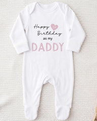 A white onesie with text printed on it, which says "Happy 1st Birthday as my Daddy".