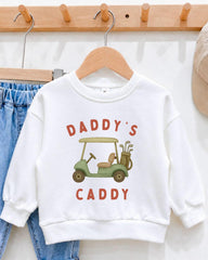 A white sweatshirt with a graphic of a golf cart and the text "DADRY'S CADDY" printed on it.