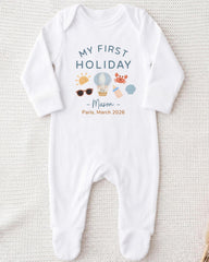 A white onesie with a printed design and text on it.