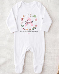 A white onesie with a personalized name and camping crew printed on it.