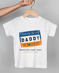 A white t-shirt with a graphic design featuring a blue and orange rectangle with the text "Cheering for my DADDY" and "Marathon Name Here Custom Date Here" printed on it.