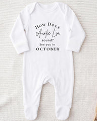 A white onesie with text printed on it.