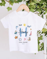 A white t-shirt with a graphic design featuring various nautical and marine-themed illustrations, including a ship, lighthouse, and other sea creatures. The text "Henry" is written above the design, and "STAR CRUISE" is written below it.