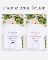 two white t-shirts hanging on a wooden hanger, each with a different design and text. The text on the t-shirts reads "PAGE BOY for Austin Lily & Uncle Josh's WEDDING 20.09.2029" and "PAGE GIRL for Austin Lily & Uncle Josh's WEDDING 20.09.2029".