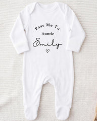 A white onesie with the text "Pass Me To Auntie Emily" printed on it.