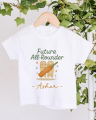 A white t-shirt with a graphic design featuring a cricket bat and the text "Future All-Rouner" and "Asher" printed on it.