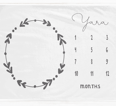 a calendar with a wreath on the front of it