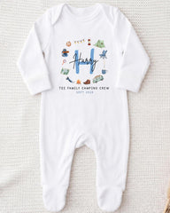 A white onesie with a personalized text and graphics printed on it.