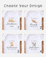 four baby t-shirts with different animal designs and names printed on them.