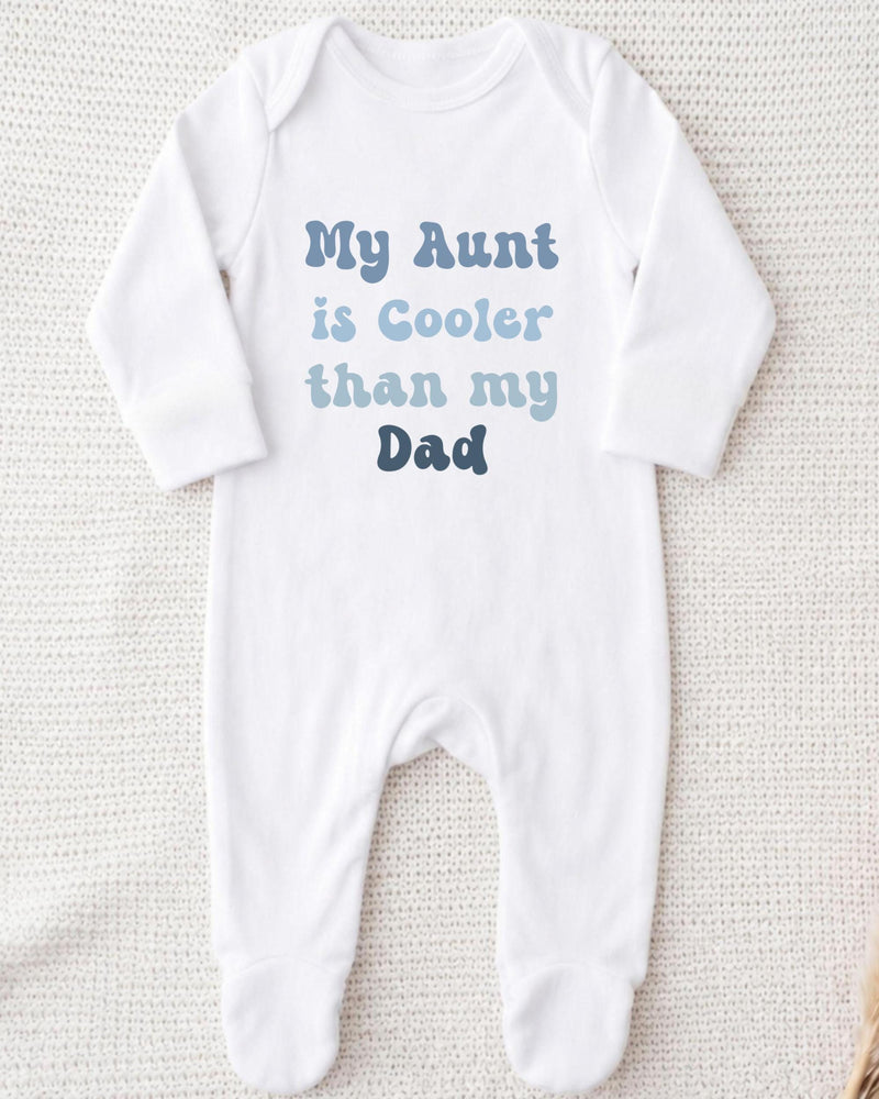 A white bodysuit with text printed on it.