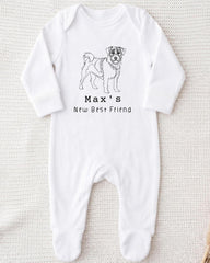 A white onesie with a black illustration of a dog and the text "Max's New Best Friend" printed on it.