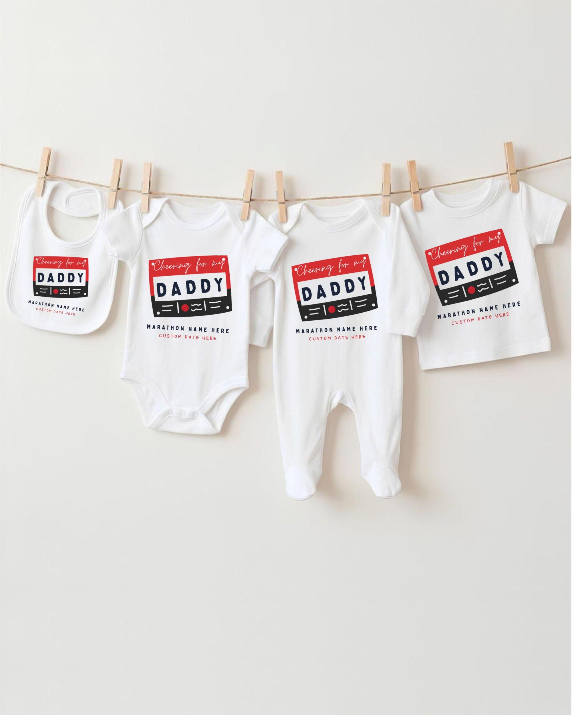 a collection of baby clothes, including onesies and bibs, hanging on a clothesline.