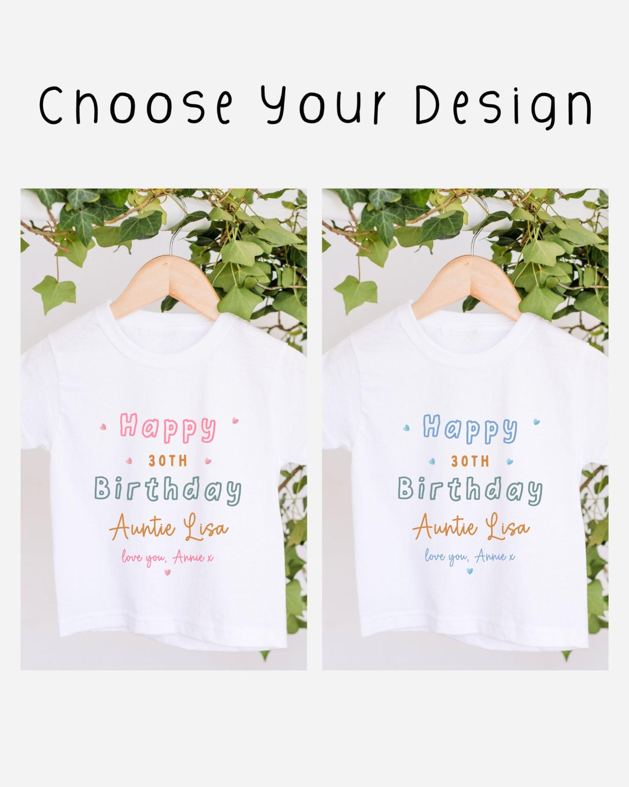 two white t-shirts hanging on a wooden hanger, each with a personalized message printed on them. The text on the t-shirts reads "Happy 30th Birthday Auntie Lisa" and "Happy 30th Birthday Auntie Lisa", indicating that the t-shirts are gifts for someone's 30th birthday celebration.