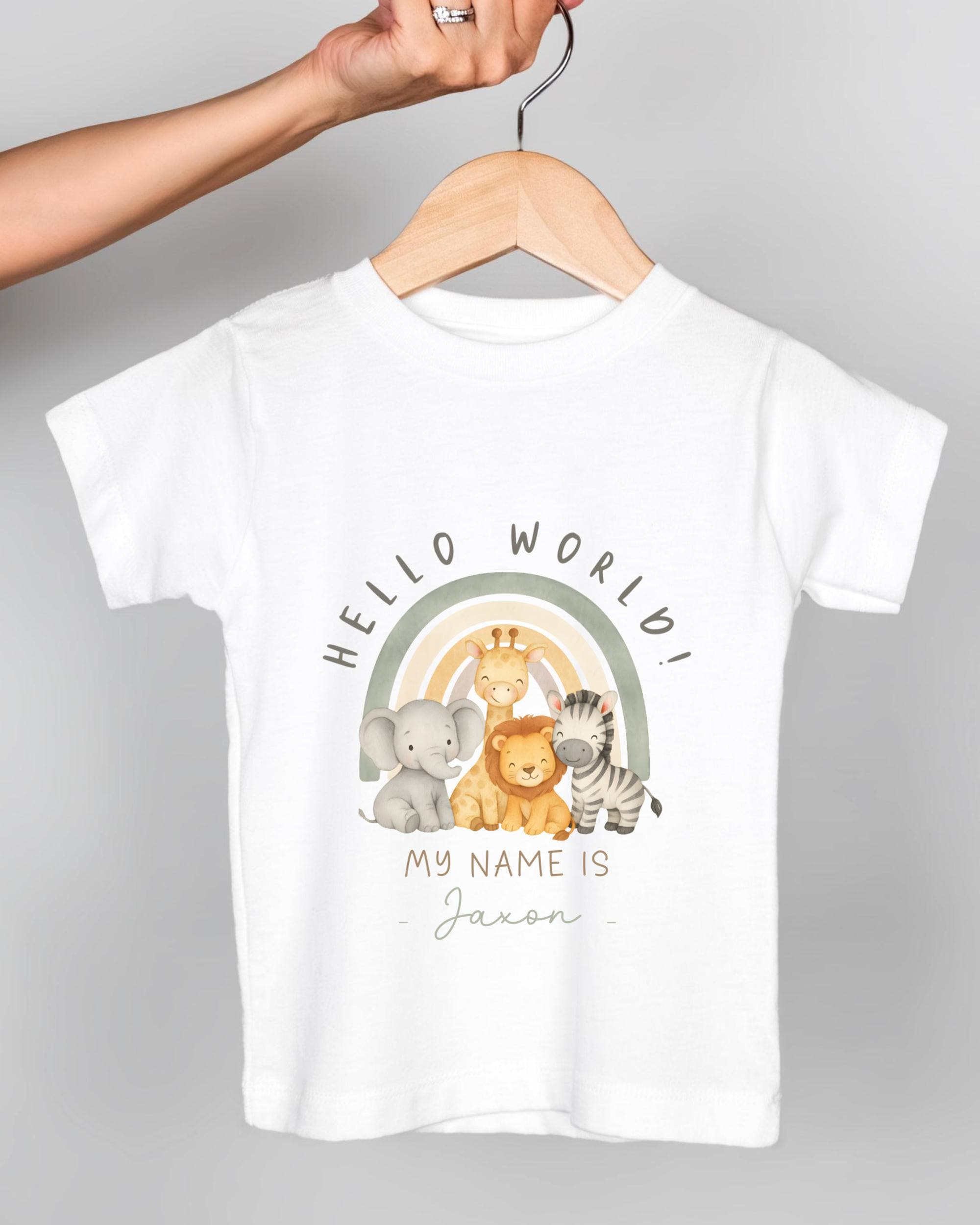 A white t-shirt with a graphic design featuring a rainbow and various animals, along with the text "Hello World! My name is Jason".