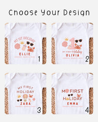 four different white t-shirts with various holiday-themed designs and text, each representing a different design choice for a child's first holiday outfit.