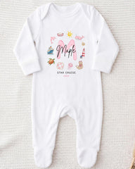 A white onesie with a personalized text and various illustrations printed on it.