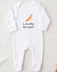 A white onesie with a printed design of a carrot and the text "Locally Grown" printed on it.