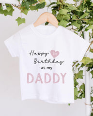 A white t-shirt with text that reads "Happy 1st Birthday as my DADDY" printed on it.
