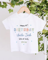 A white t-shirt with colorful text and a personalized message for Uncle Josh's 25th birthday.