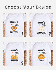 four different baby onesies with the text "Mama's little" and various food items printed on them, such as pretzels, dumplings, samosas, and tacos.
