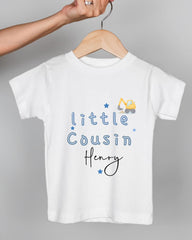 A white t-shirt with blue text and a small construction vehicle graphic printed on it.