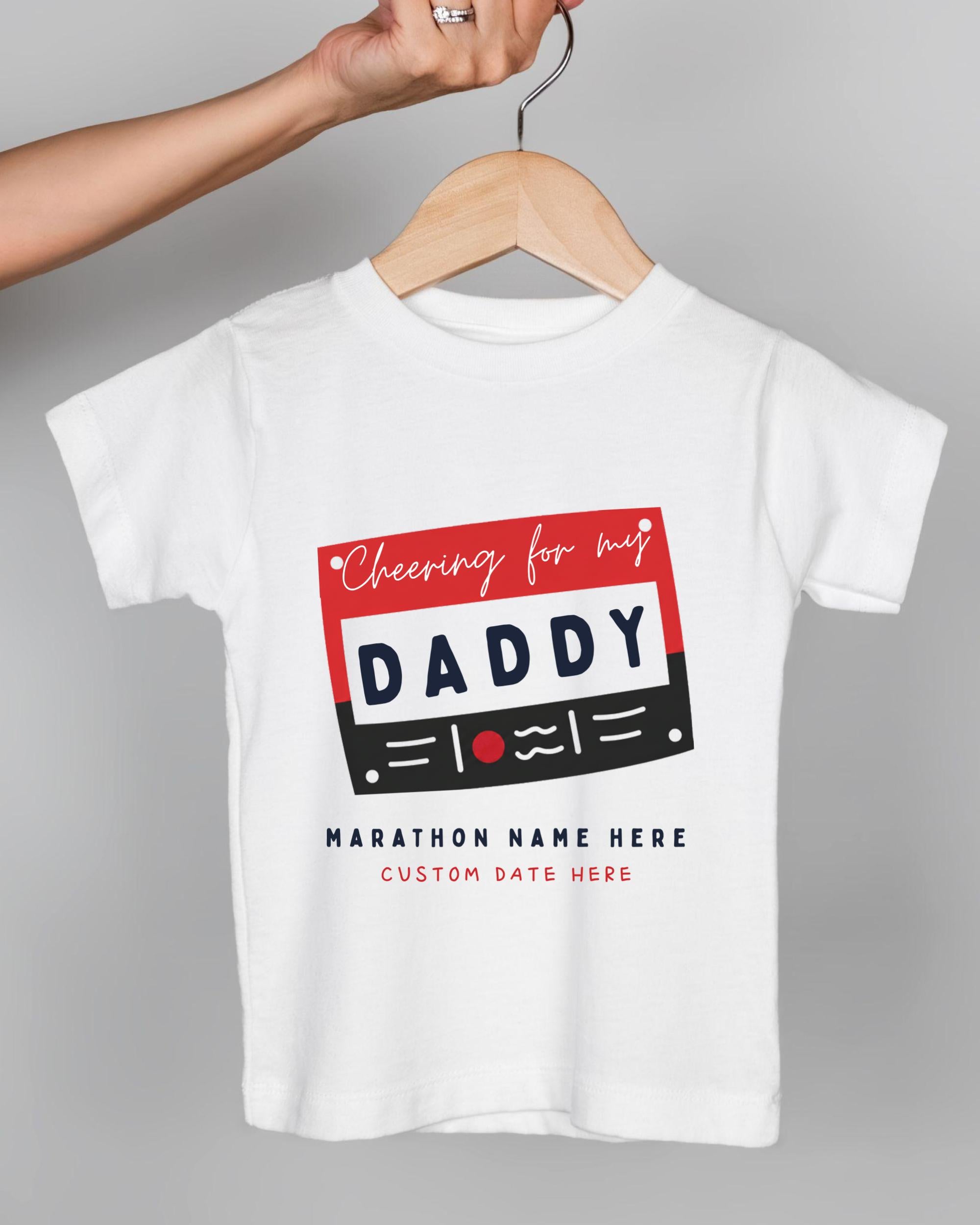 A white t-shirt with a graphic design featuring the text "Cheering for my DADDY" and "Marathon Name Here Custom Date Here" printed on it.