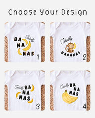 four different white t-shirts with various banana designs and text printed on them.