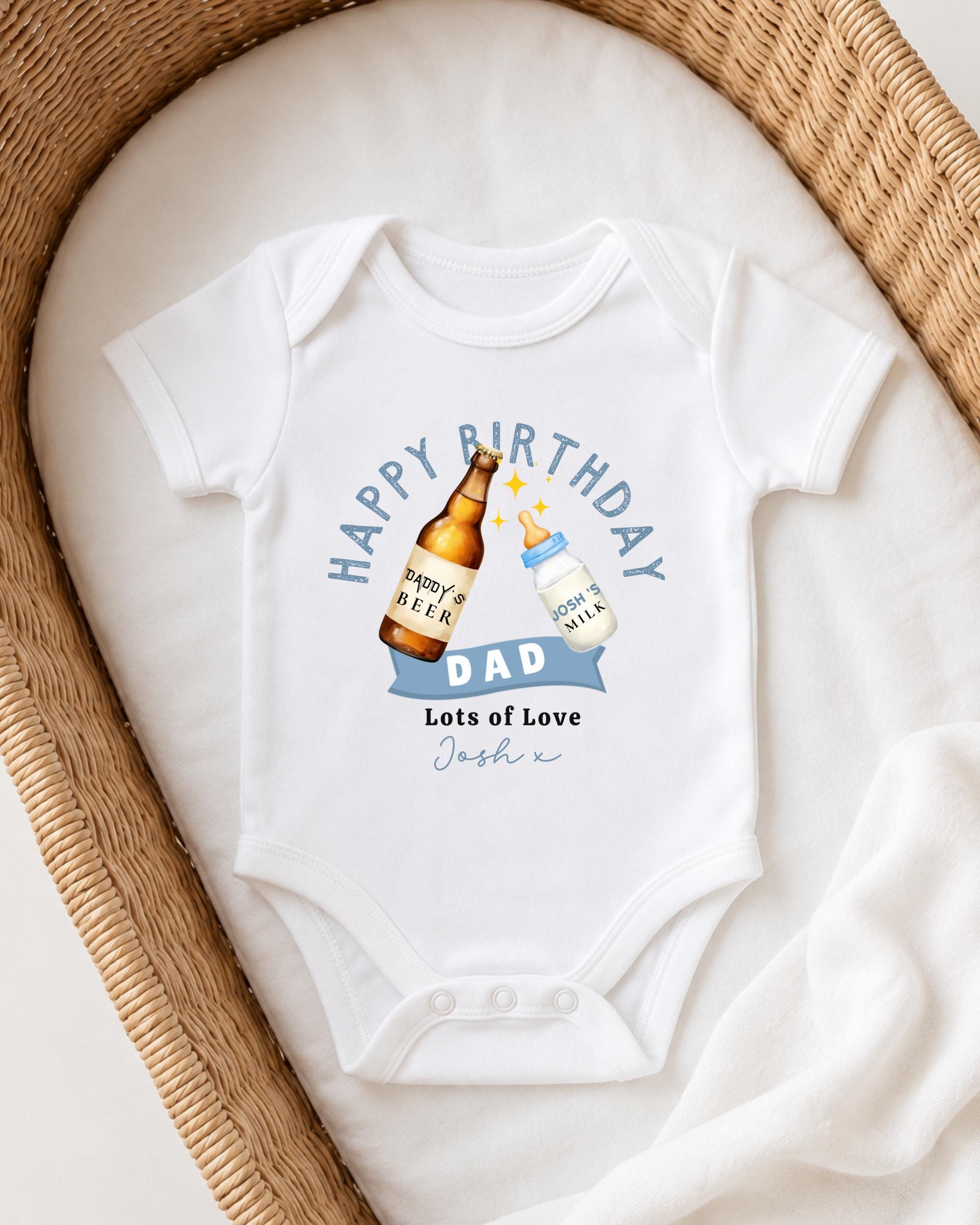 A white onesie with a graphic design on it, featuring a beer bottle and a baby bottle, along with the text "Happy Birthday Dad Lots of Love Josh".