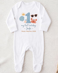 A white onesie with a personalized design and text printed on it.