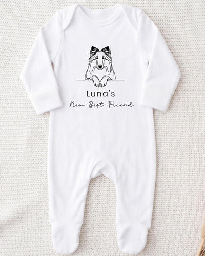 A white bodysuit with a black graphic of a dog and the text "Luna's New Best Friend" printed on it.