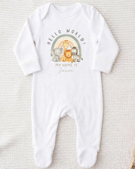 A white onesie with a graphic design featuring a rainbow and various animals, including a giraffe, lion, and zebra. The text on the onesie says "Hello World!" and "My name is [Name]".