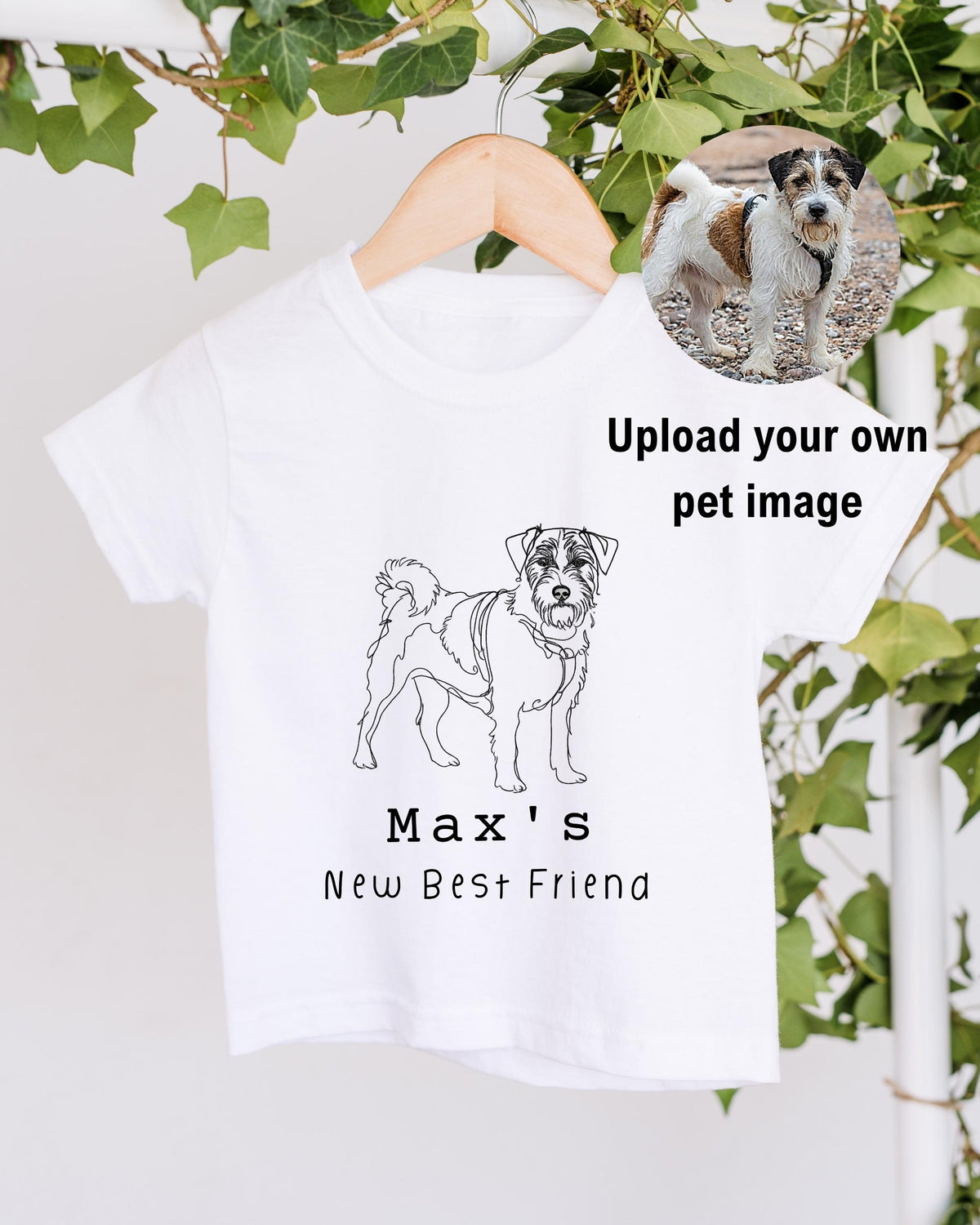 A white t-shirt with a black and white illustration of a dog, along with the text "Max's New Best Friend".