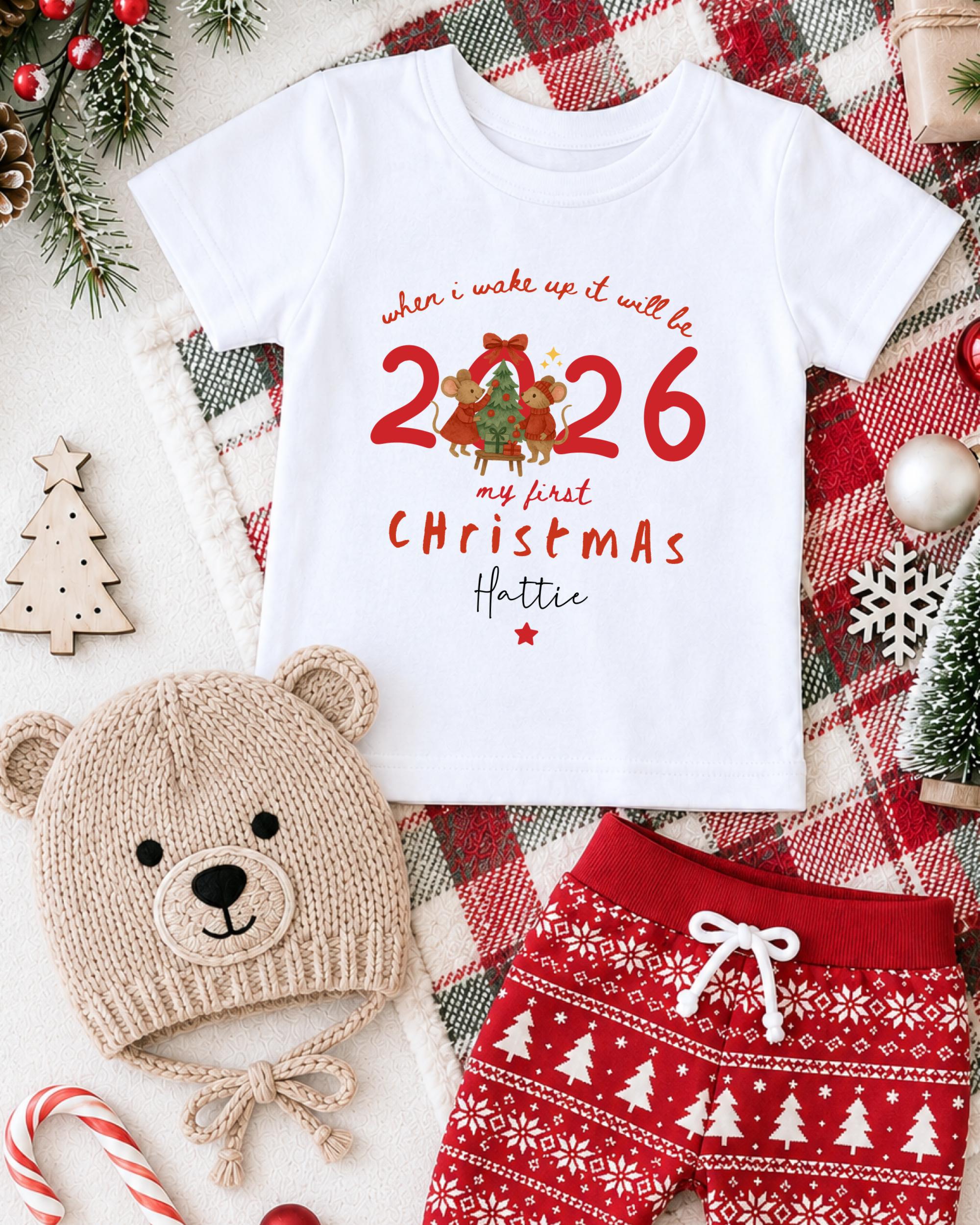 a white t-shirt with a Christmas-themed design, a beige knit hat, red and white patterned shorts, and various Christmas decorations such as a Christmas tree, ornaments, and a snowflake.