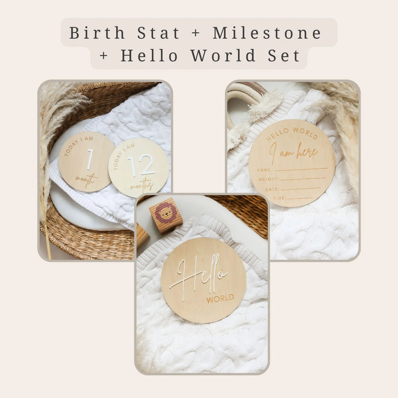 a set of three wooden tags with the words hello world on them