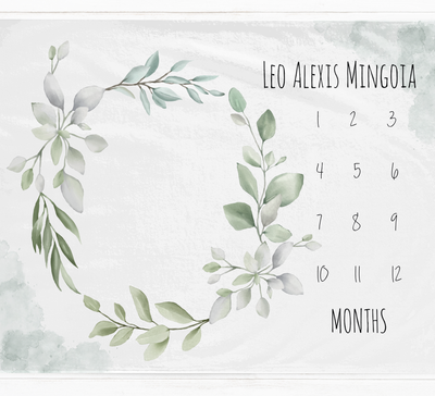 a calendar with a wreath of leaves on it