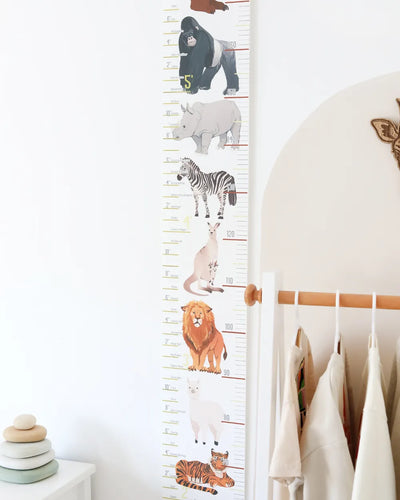 a child's growth chart with animals on it