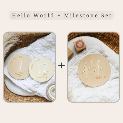 a set of three wooden coasters with the words hello world and a teddy bear
