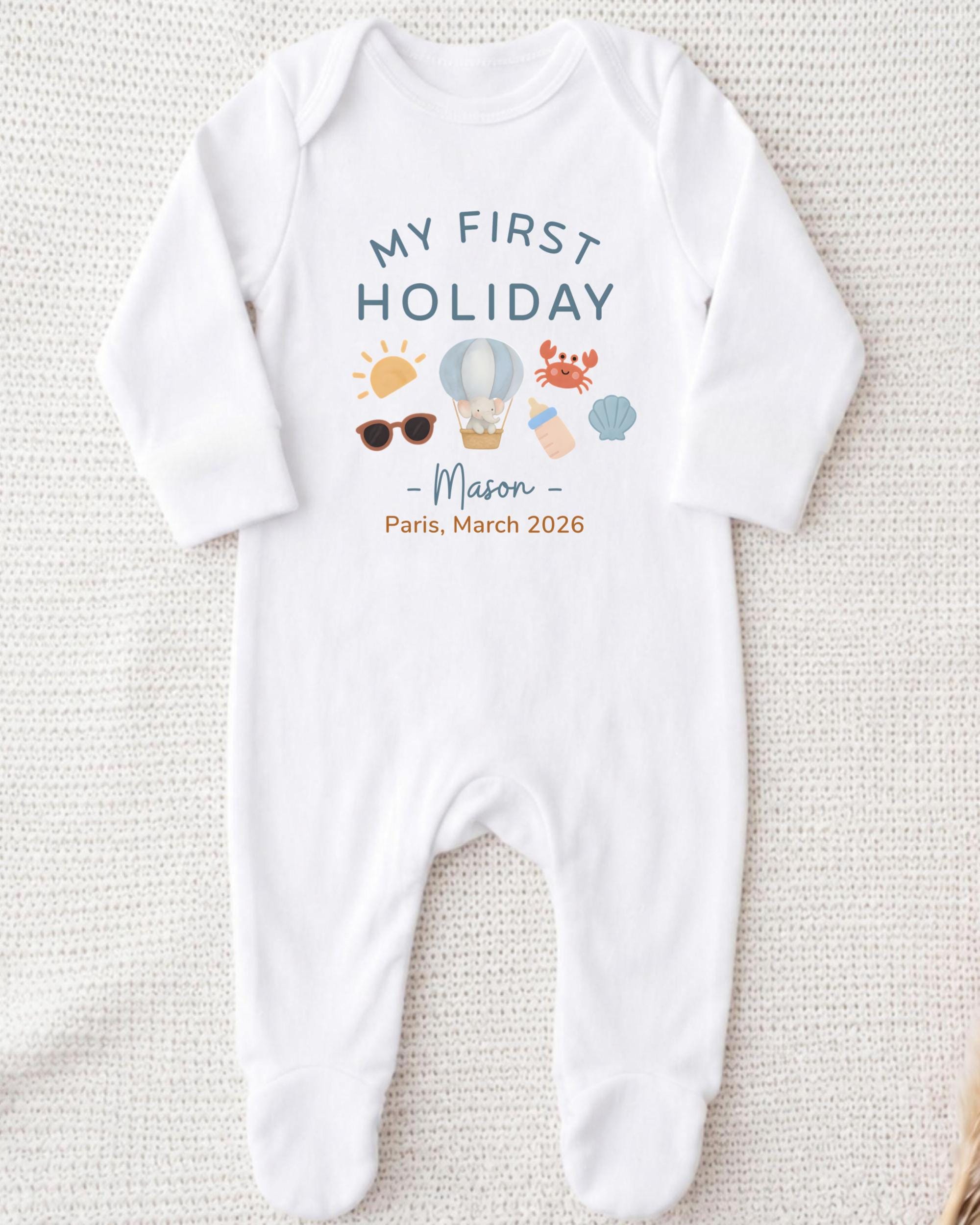 A white onesie with a printed design and text on it.