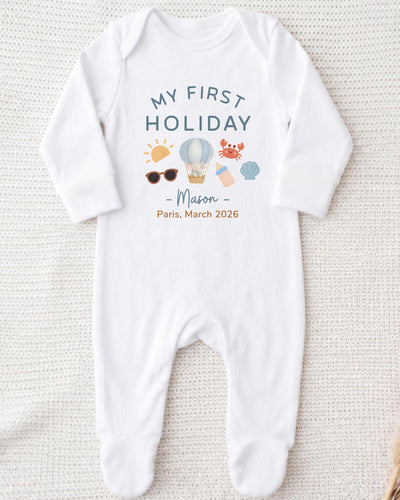 A white onesie with a printed design and text on it.