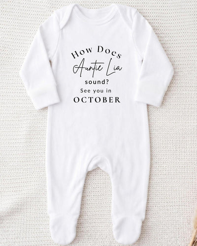 A white bodysuit with text printed on it.