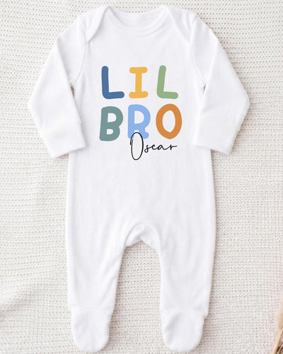 A white bodysuit with the text "LIL BRO Oscar" printed on it.
