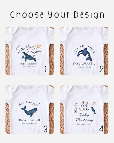 Four personalisable white Baby Vest designs with black 'Sea You Soon' lettering, baby names and dates, plus ocean graphics including whales, a dolphin and a lighthouse.