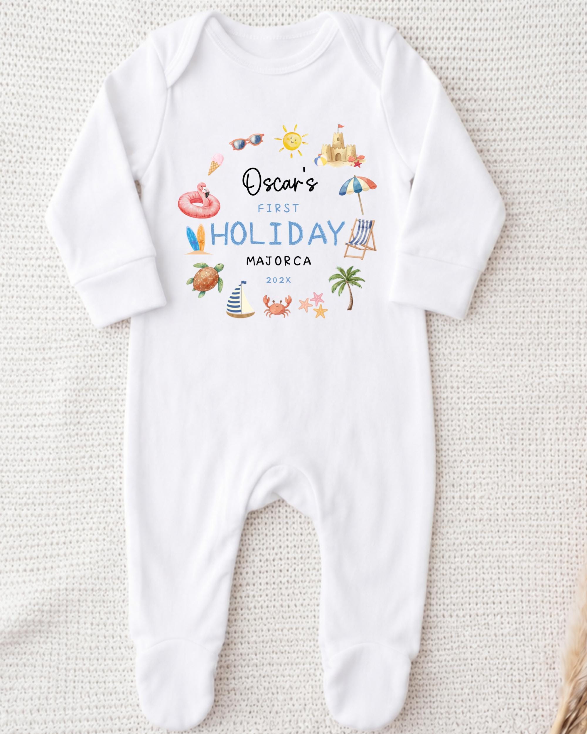 A white onesie with a personalized message printed on it, featuring various summer-themed illustrations.