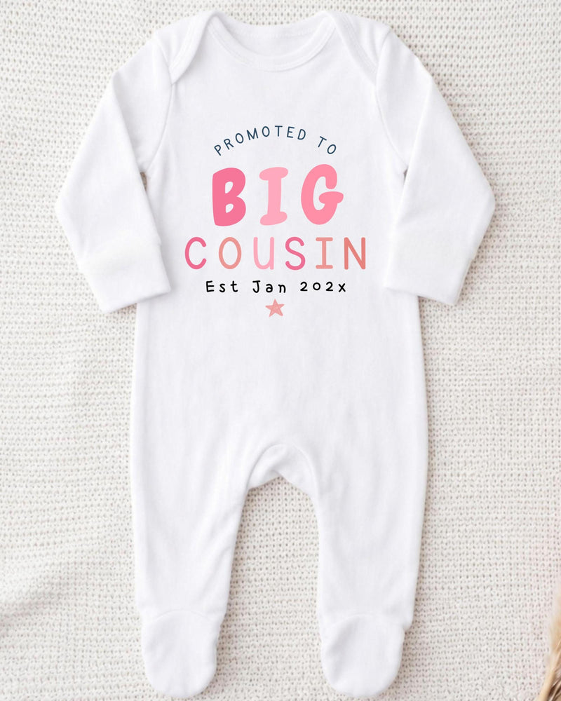 A white bodysuit with text printed on it.