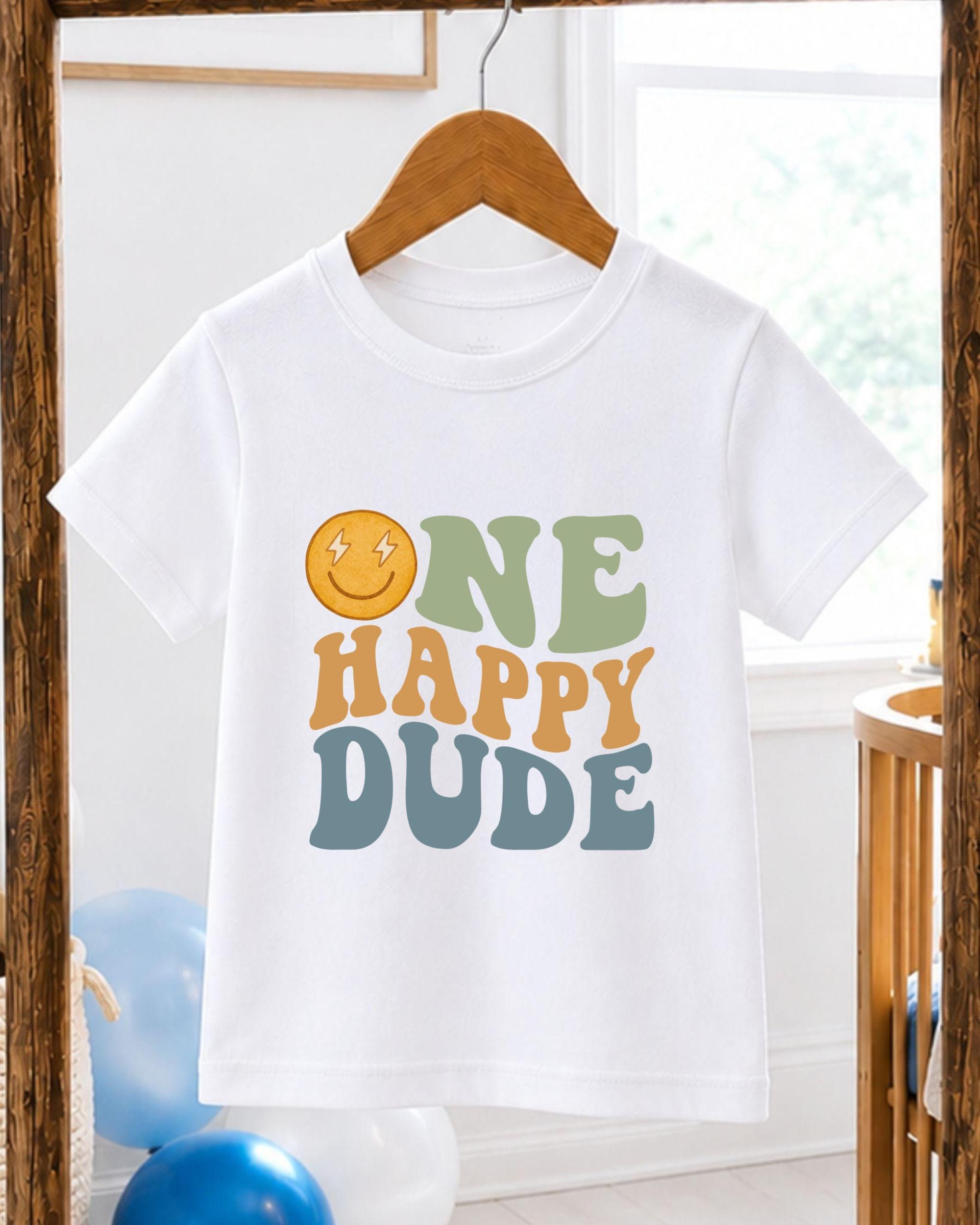 A white t-shirt with a colorful graphic design and text printed on it.