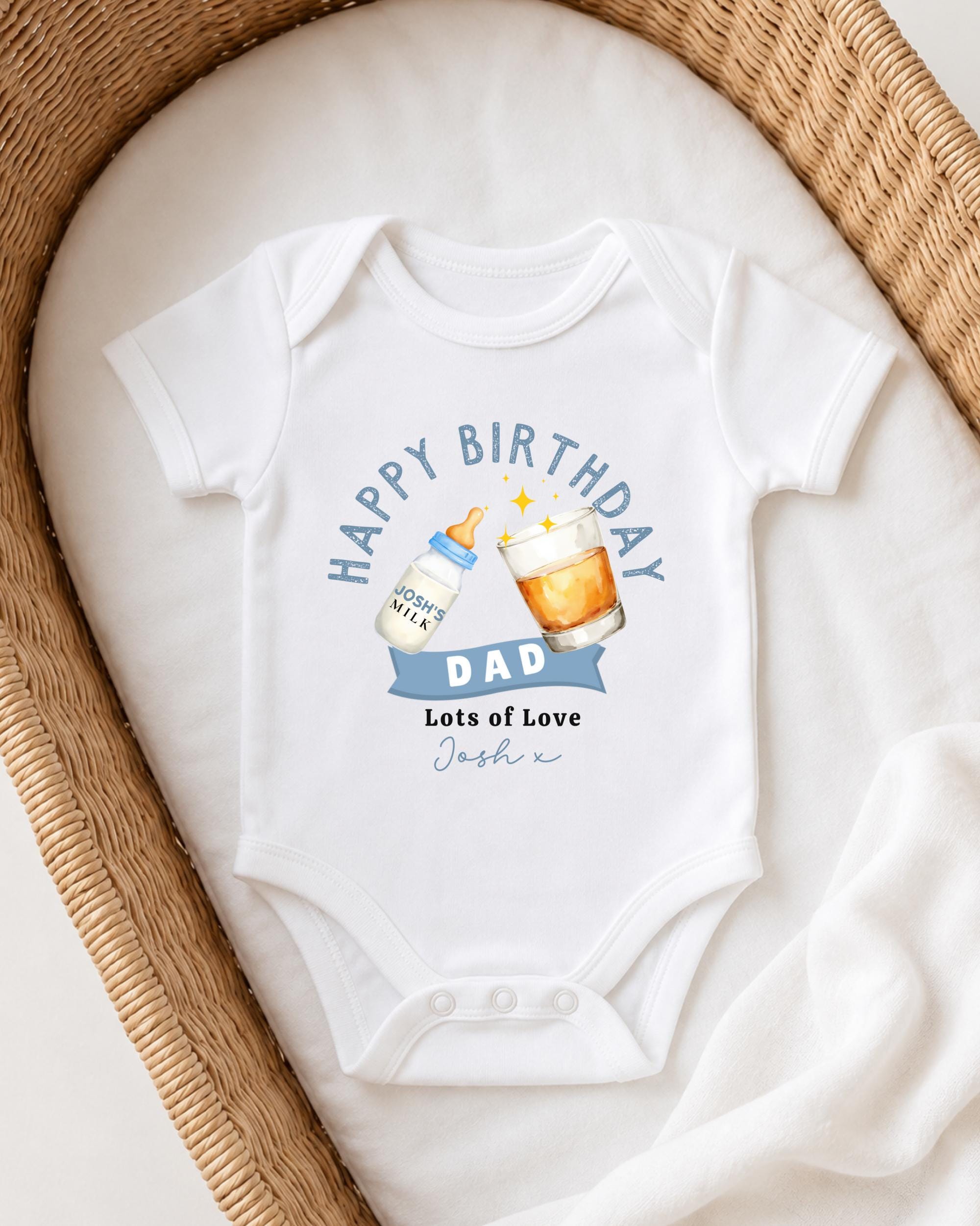 A white onesie with a birthday message and illustrations of a bottle and a glass of beer.